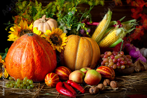 The table  decorated with vegetables and fruits. Harvest Festival. Happy Thanksgiving. Autumn background. Selective focus.