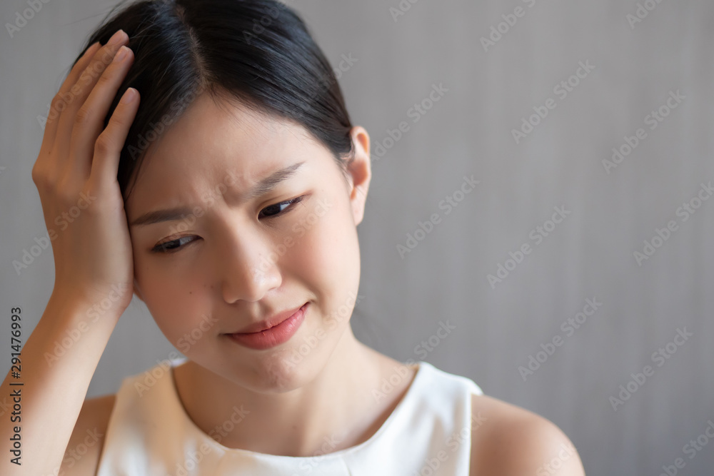 depressed woman suffering from headache, stress, depression, burnout; health care concept depressed woman suffering from headache, stress, depression, burnout; health care concept