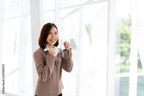 Happy business woman in an office
