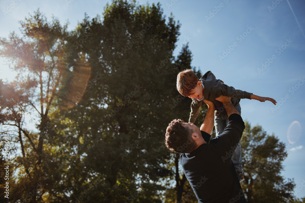 Father and Son having fun in the park Father and Son having fun in the park