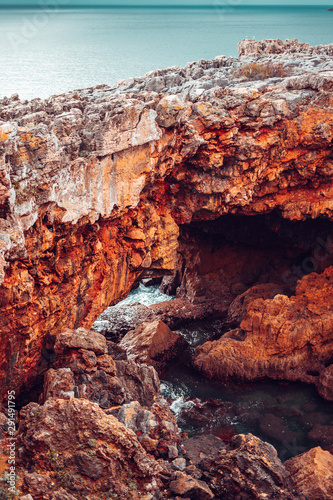 Stone bridge made of cliffs near the ocean © Ruben Chase