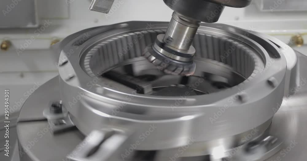 Metalworking CNC lathe milling machine. Cutting metal modern processing technology.