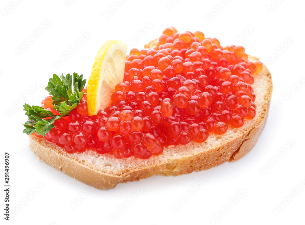 Slice of bread with red caviar and lemon on white background