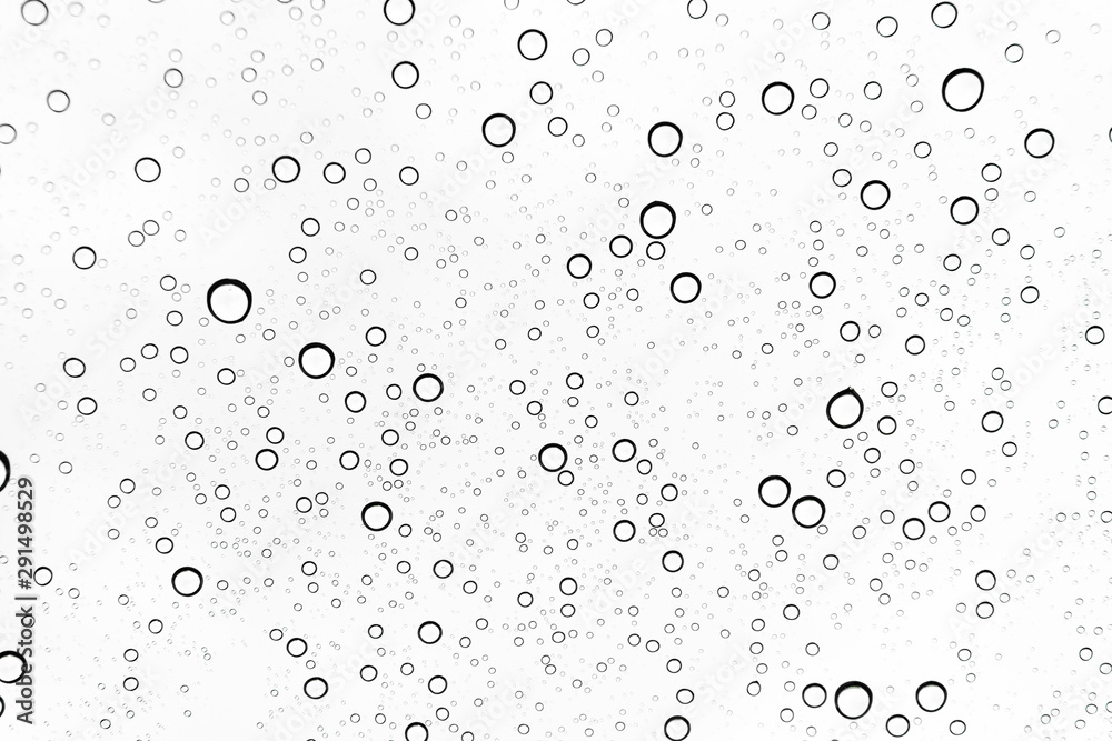 Rain drops on window glasses surface Natural Pattern of raindrops. Natural pattern of raindrops on white background for your design.