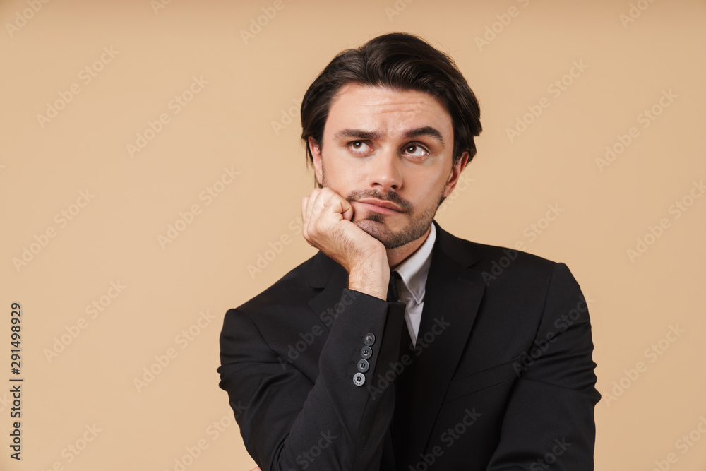 Portrait of a handsome young businessman wearing suit Portrait of a handsome young businessman wearing suit