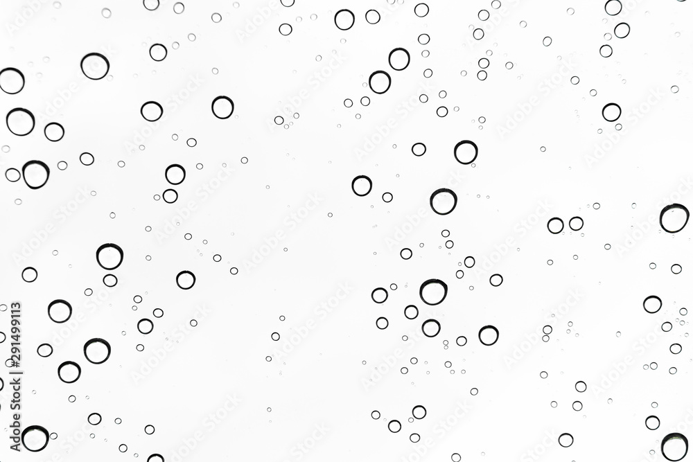 Rain drops on window glasses surface Natural Pattern of raindrops. Natural pattern of raindrops on white background for your design. Rain drops on window glasses surface Natural Pattern of raindrops. Natural pattern of raindrops on white background for your design.