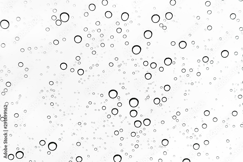 Rain drops on window glasses surface Natural Pattern of raindrops. Natural pattern of raindrops on white background for your design.