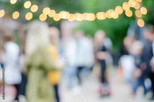 Wallpaper Mural Blurred background. Blurred background on the street with lights-lanterns. Street festival. Torontodigital.ca