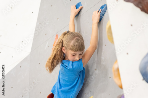 Teenage girl climbing