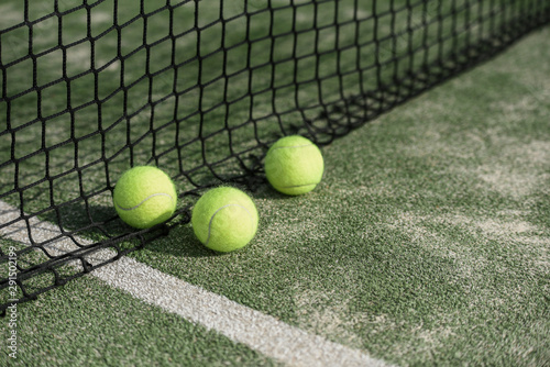 close up of a padel and tennis court with artificial grass