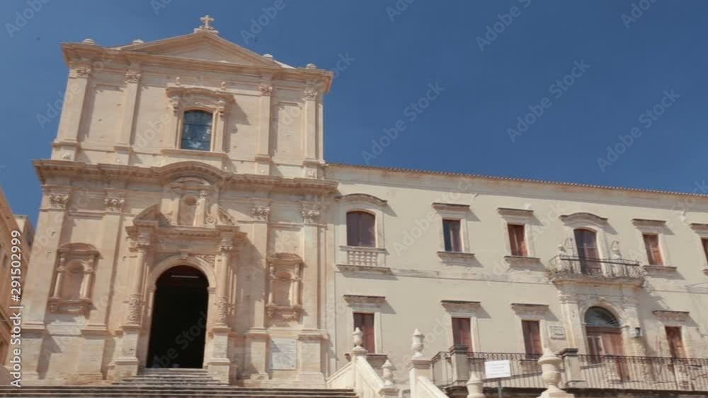 The spectacular façade of the Baroque church of S. Francesco d'Assisi and monastery of S. Salvatore in Noto, Sicily Italy. The spectacular façade of the Baroque church of S. Francesco d'Assisi and monastery of S. Salvatore in Noto, Sicily Italy.