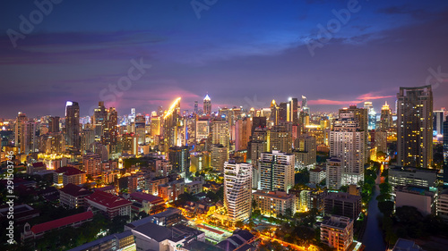 night cityscape lighting up and twilight skyline in metropolis © bank215
