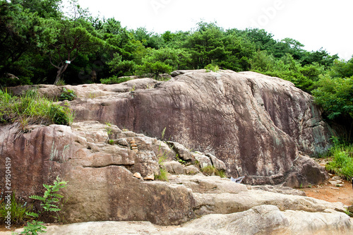 Buddha statue carved into the rock in Gyeongju-si, South Korea.