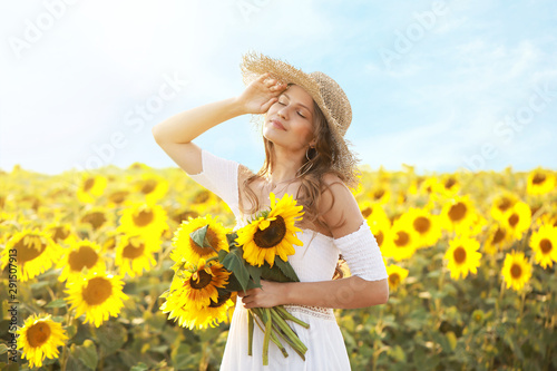 Beautiful young woman in su...