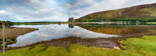 A panoramic view of the 13th century castle at Lochranza at high tide on the Isle of Arran in Scotland