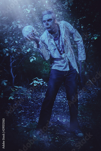 zombie holding skull
