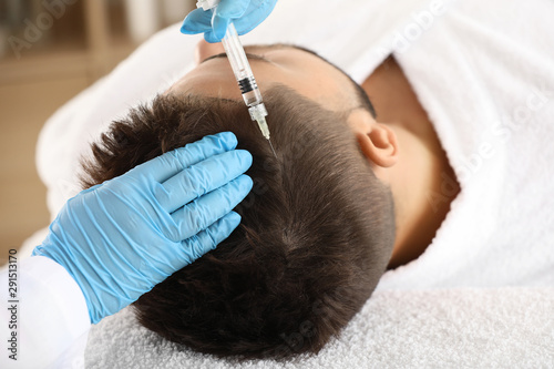 Man with hair loss problem ...