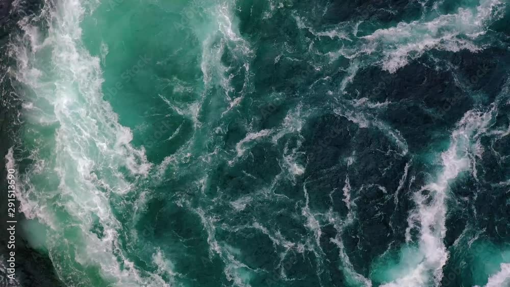 Waves of water of the river and the sea meet each other during high tide and low tide. Waves of water of the river and the sea meet each other during high tide and low tide.