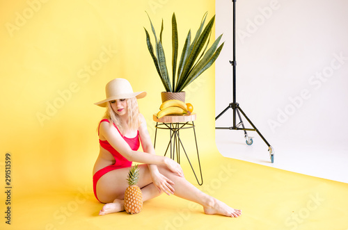 Portrait of pretty girl with pineapple © anniebrusnika