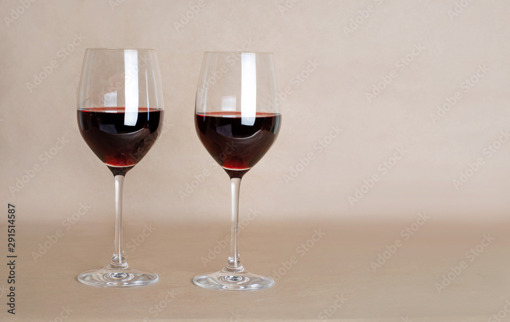 Red wine in glasses. Two glasses of red wine.