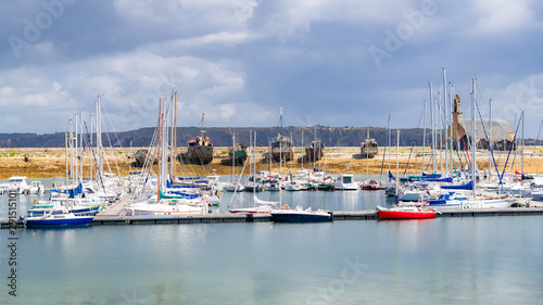 Camaret-sur-Mer in Brittany, the harbor, and the boats cemetery in background