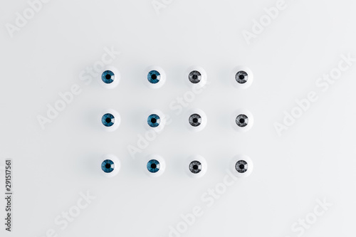 a dozen of glass eyes isolated on white background photo