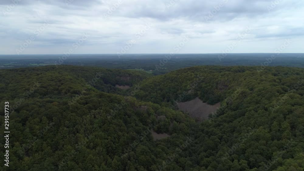 Aerial view of forest and mountain landscape in Southern Sweden. Drone shot flying over valley in national park, nature background in 4K resolution Aerial view of forest and mountain landscape in Southern Sweden. Drone shot flying over valley in national park, nature background in 4K resolution
