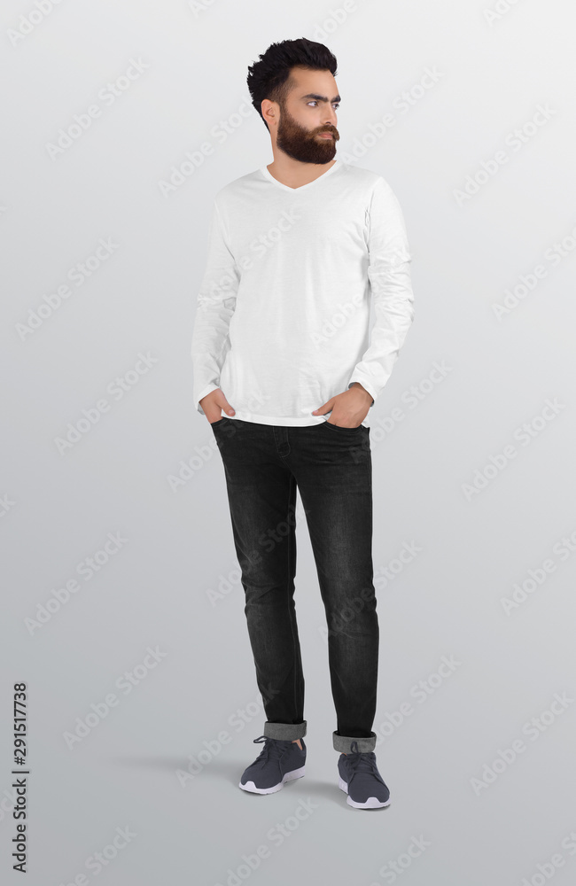 Standing man wearing white blank v neck long sleeve shirt in black jeans pant. Isolated background Standing man wearing white blank v neck long sleeve shirt in black jeans pant. Isolated background