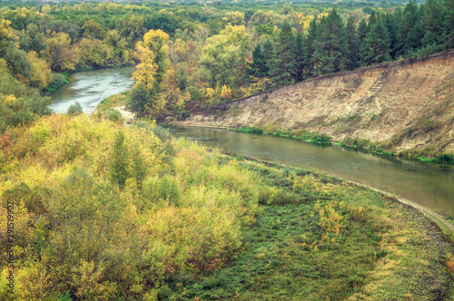 Scenic autumn winding valley Hoper river. Picturesque nature floodplain, sandy cliff edge background Aerial view