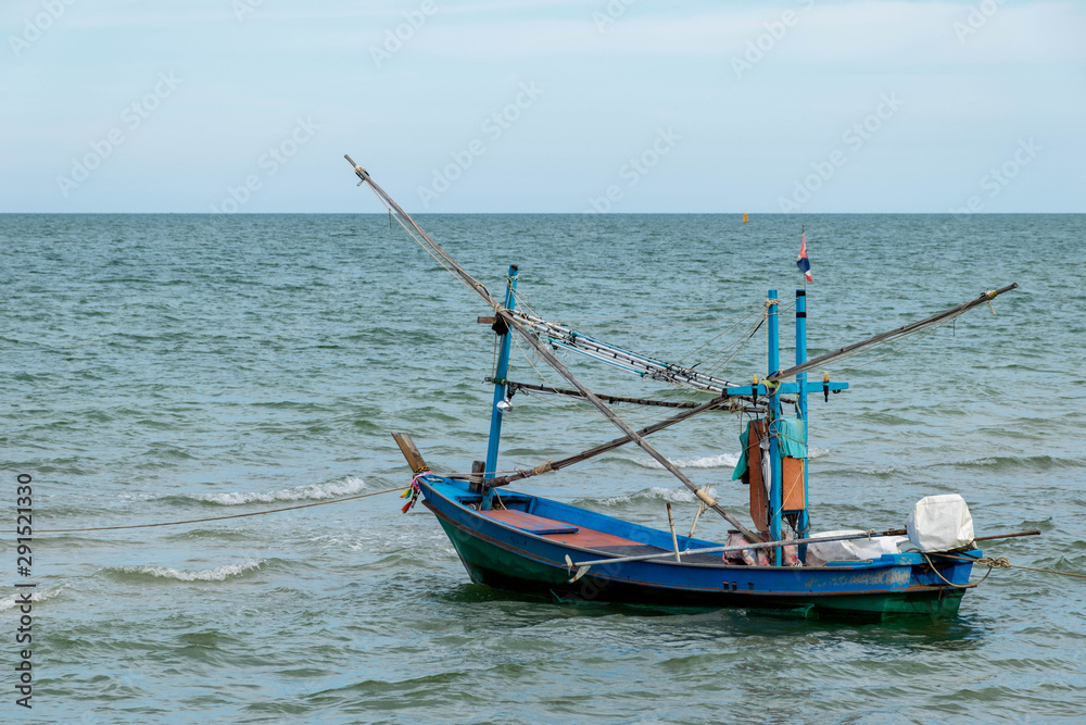Fototapeta premium Small fishing boats parked on the beach.