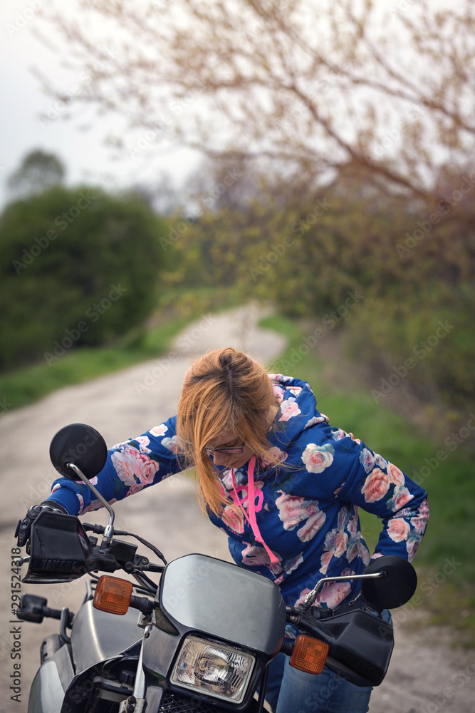 girl on dirt bike riding off road