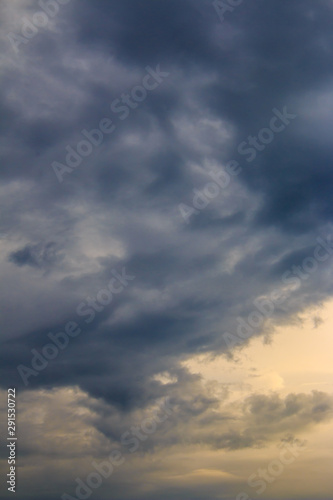 Background of Dark ominous grey storm clouds. Dramatic sky