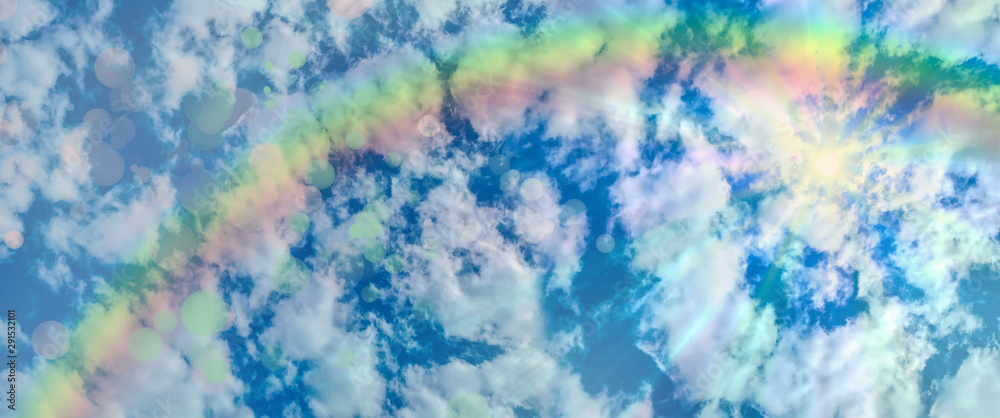 blue sky with Cirrus clouds sky background border rainbow sun rays
