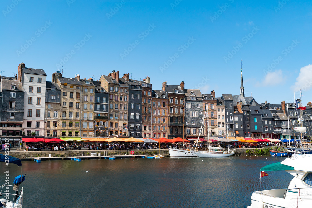 view of the Vieux Bassin harbor and port in the picturesque village of Honfleur in France