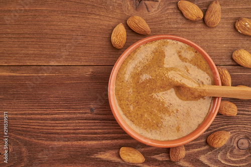 Photos almond butter, raw food paste made from grinding almonds into a nut butter, crun