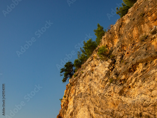 cliff face against the blue sky