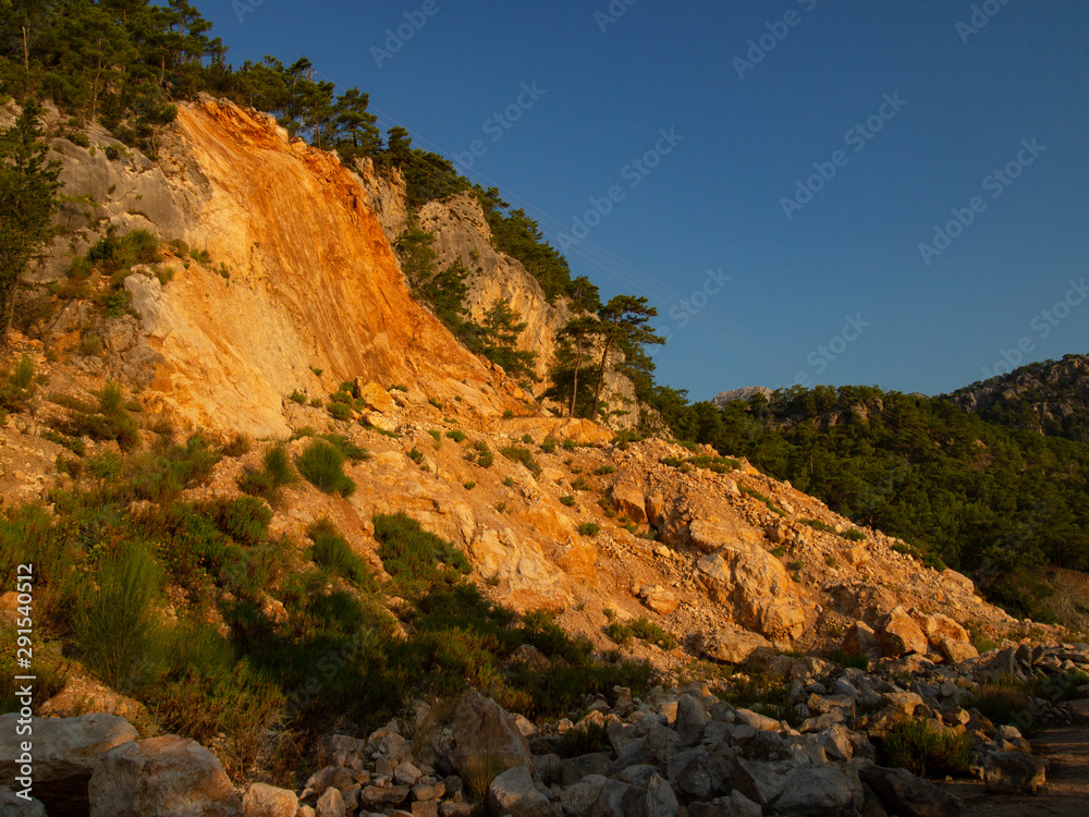 cliff face against the blue sky