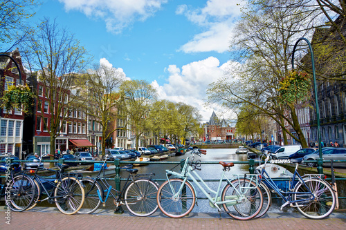 Bicycles parked on a bridge in Amsterdam, The Netherlands