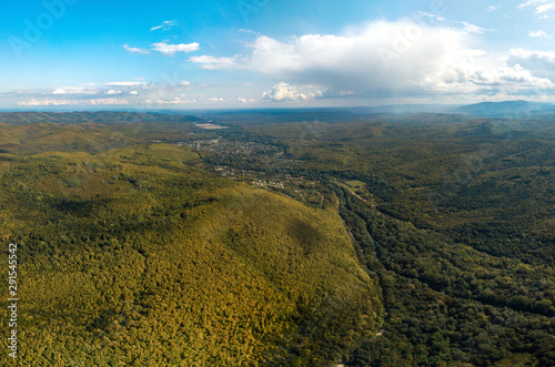 village Krepostnaya  western Caucasus  South of Russia  on a sunny day in early autumn  surrounded by low mountains covered with forest