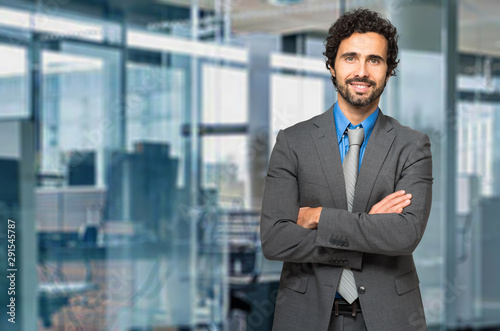 Portrait of a handsome businessman in a modern office