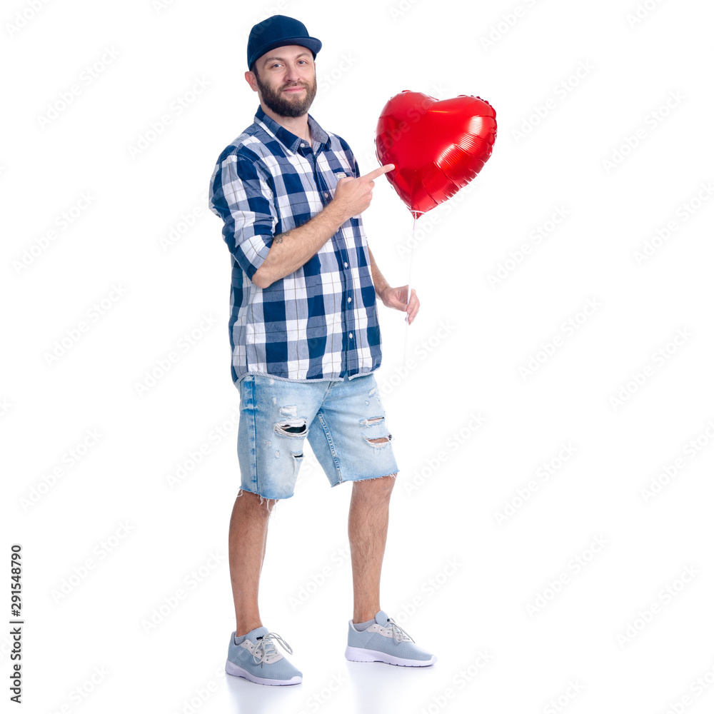 Man with red balloon shape heart in hand standing smiling on white background isolation Man with red balloon shape heart in hand standing smiling on white background isolation