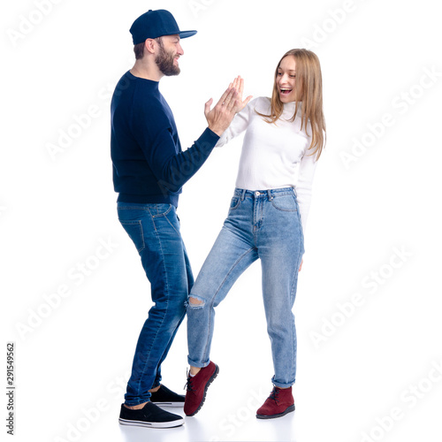 Young couple woman and man gives five hand on white background isolation