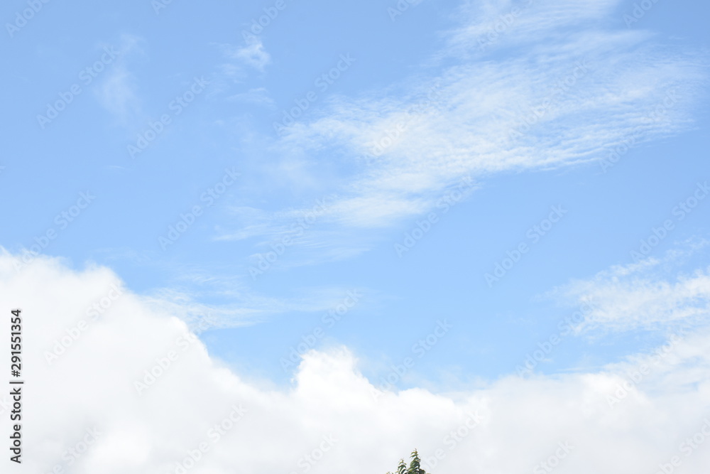 Obraz premium blue sky and white clouds and space background 