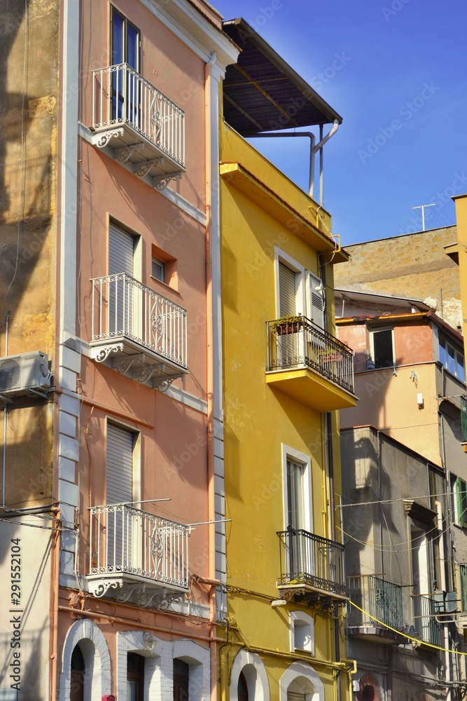 Gaeta, Italy - DECEMBER 26, 2018: Beautiful colorful buildings with balconies, old city.