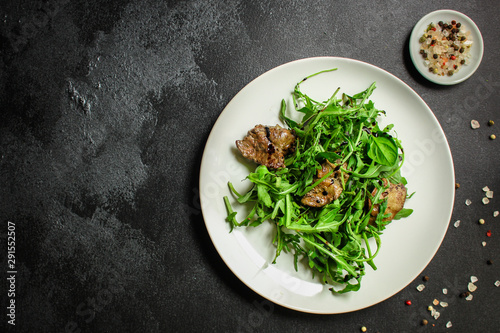 healthy salad with liver (tasty appetizer) menu concept. food background. copy space. Top view