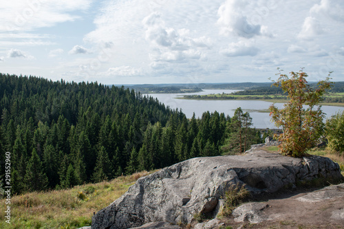 View on the lake in the forest from a high hill