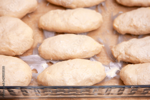 ready to cook food made from dough in glass tray