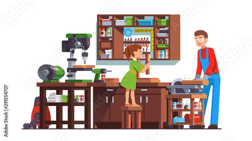 Girl kid helping father carpenter doing woodwork