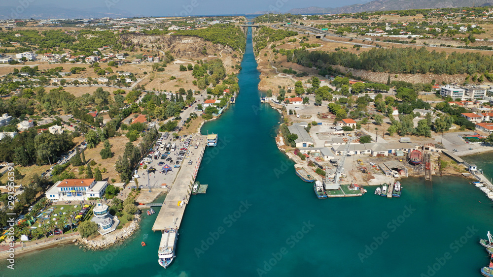 Fototapeta premium Aerial bird's eye view photo taken by drone of stand up paddle surfers in annual SUP crossing competition in Corinth Canal, Greece