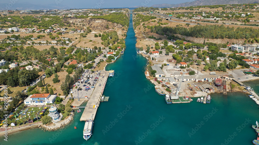 Aerial bird's eye view photo taken by drone of stand up paddle surfers in annual SUP crossing competition in Corinth Canal, Greece